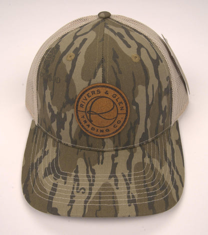 R&G Trucker Hat Mossy Oaks Original Bottomland/Tan Leather Patch 112 Rivers and Glen Trading Co. Hats MOBL/Tan/LeatherPatch/112OC Headwear Rivers and Glen Trading Co